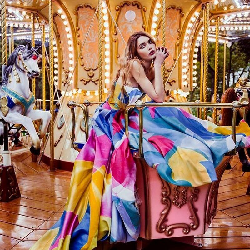 woman wearing dress on carousel